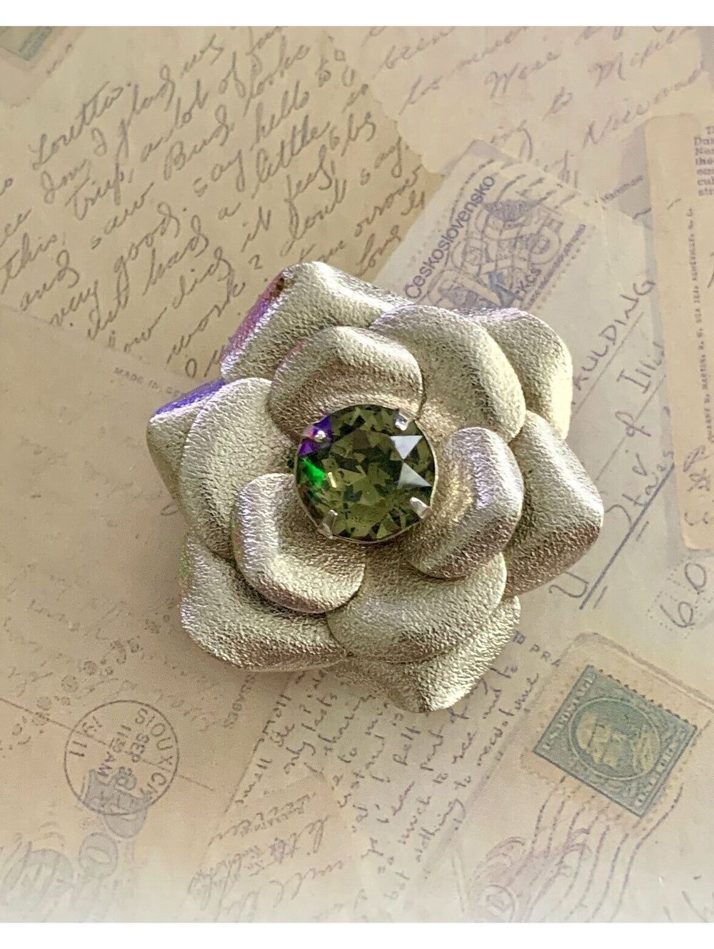 Vintage Sparkling Silver Flower Pin with Green Gemstone Center - Elegant Brooch